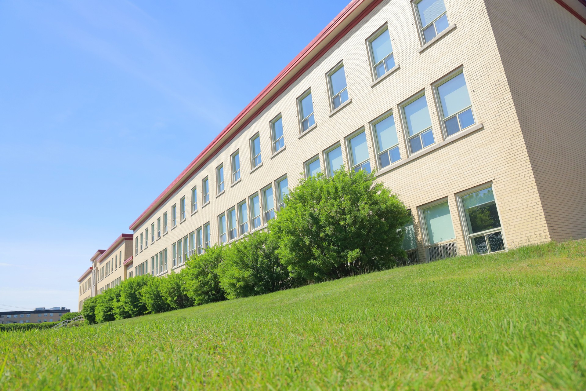 Classic High School Building in Summer